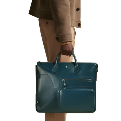 Montblanc borsa 24/7 soft blu legion in pelle blu petrolio con design strutturato e manici verde scuro maestria artigianale