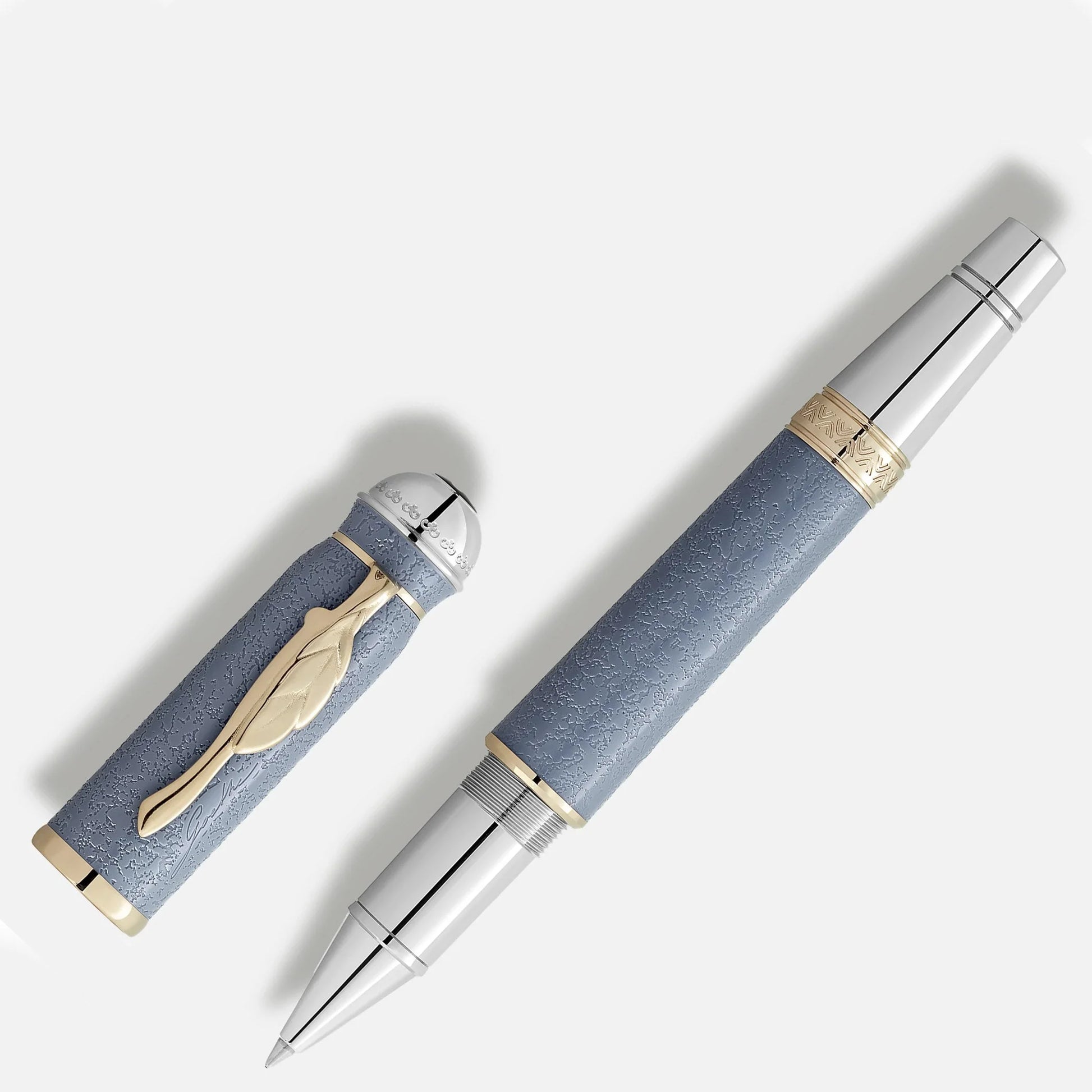 Montblanc rollerball pen in light blue leather finish with silver and gold accents homage to johann wolfgang von goethe