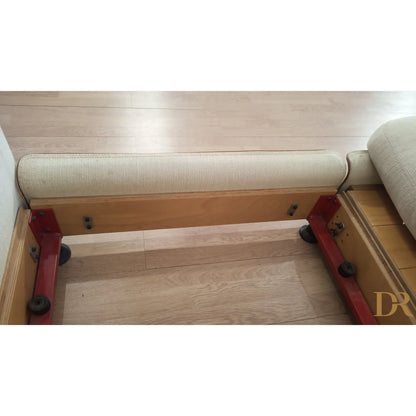 White cylindrical foam roller with red mounting brackets part of riccardo arbizzoni modello redifiori set divano zanotta 1978